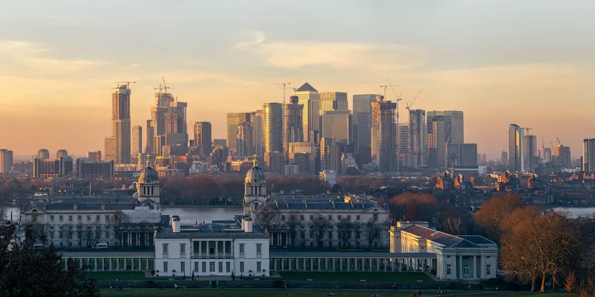 London skyline at dusk, establishing KGCP's presence in the City